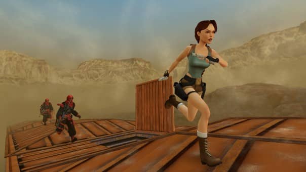 Lara running across the trains in the Tomb Raider IV-VI Remastered Review
