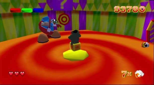 Glover (QUByte Classics) review – Facing the clown boss in a high-energy battle, dodging attacks and using precise ball maneuvers to win.
