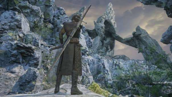 Rise of Rebellion Review – A lone warrior stands overlooking the vast, atmospheric landscape, highlighting exploration and scale.