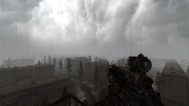 A haunting night-time scene from the S.T.A.L.K.E.R.: Legends of the Zone Trilogy review, with rain pouring over the desolate landscape.
