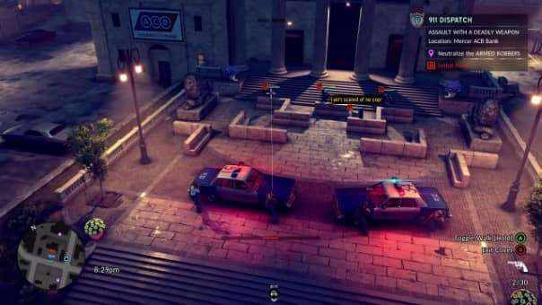 A tense nighttime standoff in The Precinct review, as two police cruisers face each other under the city lights.