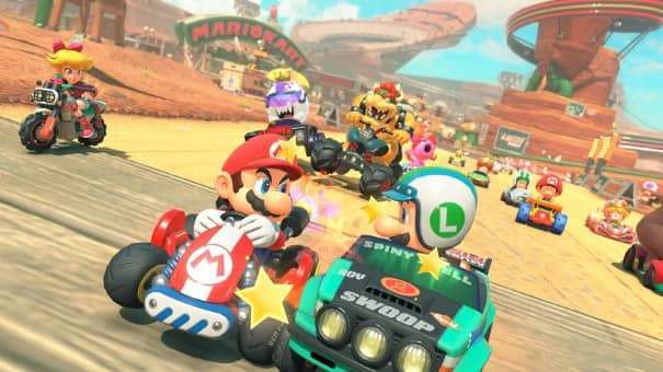 Mario and Bowser clash in a heated kart duel from the Mario Kart World review.