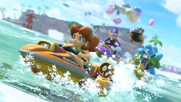 An intense jetski course from the Mario Kart World review, featuring racers skimming over vibrant blue waves.