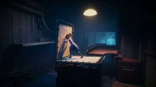 Sophie pushes a fold-out bed in Out of Sight, transforming it into a makeshift platform during a tense puzzle sequence.