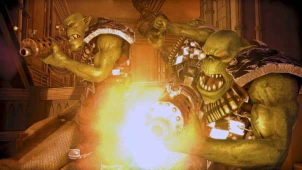 Two Ork boyz unleash a barrage of firepower in the Warhammer 40000: Space Marine Master Crafted Edition review, showcasing chaotic combat.