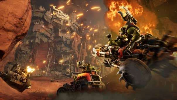 Warhammer 40000: Speed Freeks review captures Ork Boyz launching into battle, their car soaring into the fray.