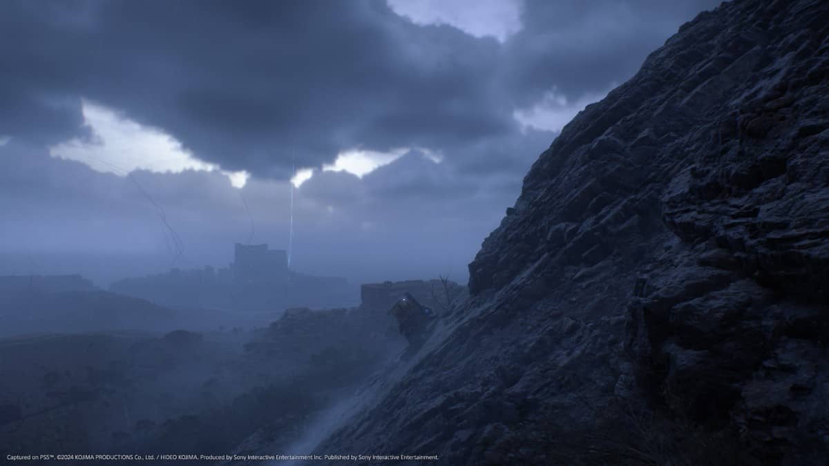 Sam climbs a perilous mountainside in Death Stranding 2: On the Beach as a storm unleashes chaos behind him.