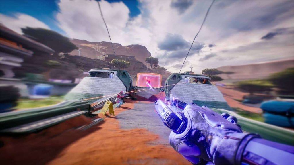 First-person pistol shot lands mid-sprint in Splitgate 2 review.