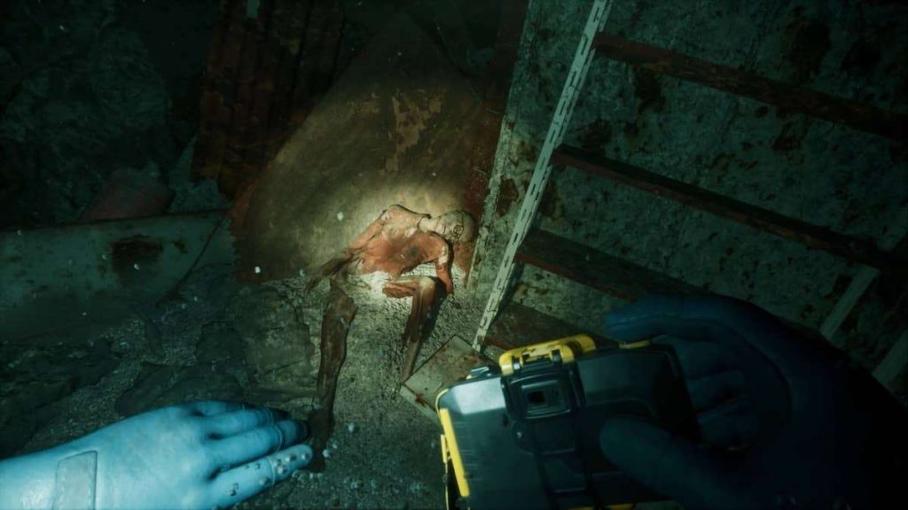 our character photographs skeletal remains of a crew member submerged underwater in this review scene.
