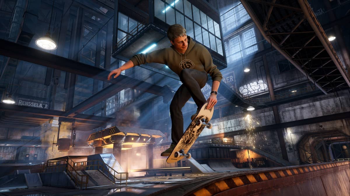 Tony Hawk catches air above the Foundry half pipe in our review gameplay snapshot.