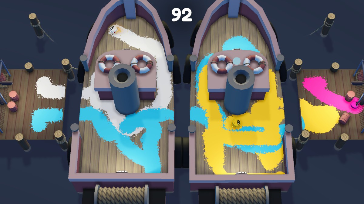 Splatterbot boat stage with two vessels filling with paint as the battle spills out to sea.