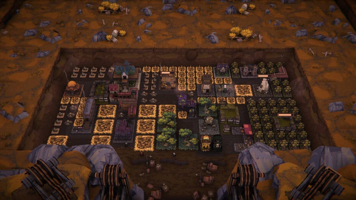 A wide view of the evolving town in BALL x PIT, showing strategic building placement and resource tiles in action.