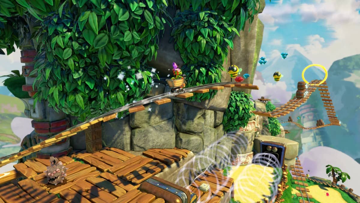 Yooka and Laylee speeding through a mountain-side minecart track in Yooka-Replaylee, showcasing fast-paced platforming.