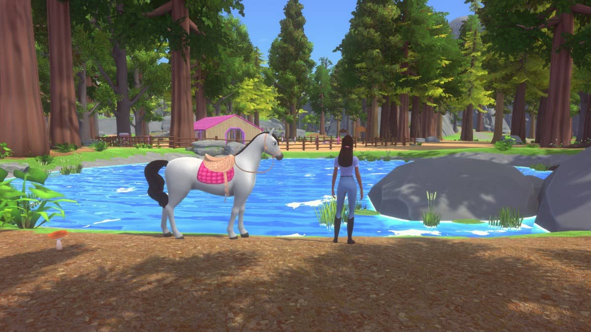 Barbie and friends gather at a sparkling water source under clear skies in Barbie Horse Trails, embracing the joy of outdoor exploration.