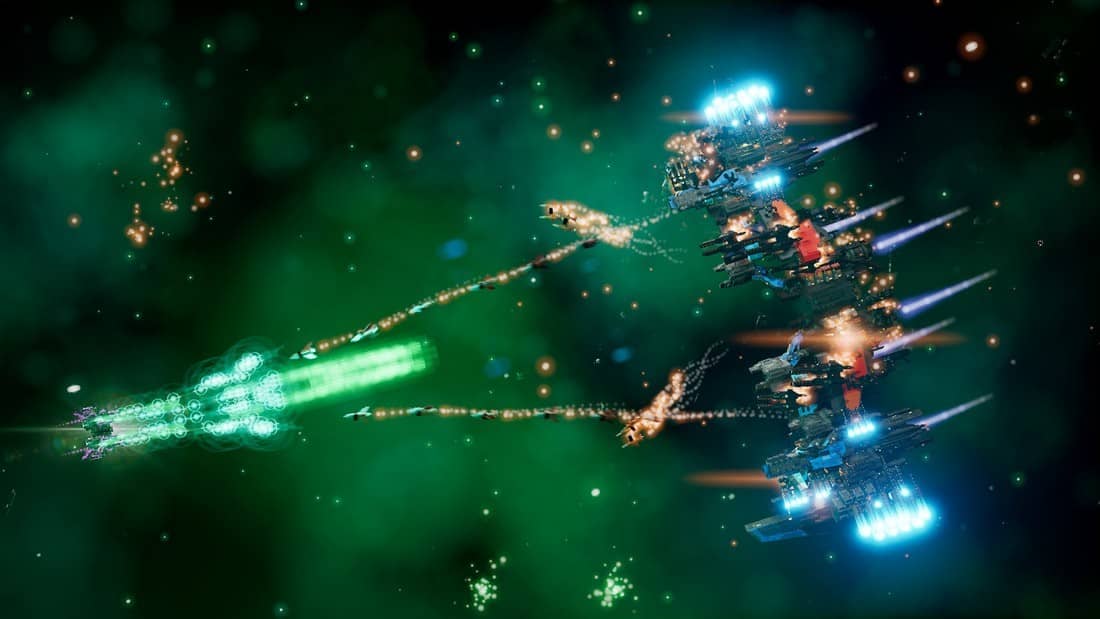 A dense enemy swarm in Beat Hazard Arcade set against a vivid green starfield filled with cosmic energy and chaos.