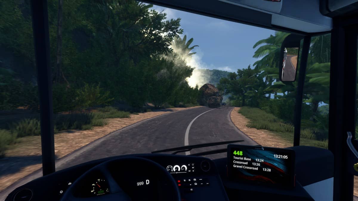 First-person driving in Bus World through a sunny tropical road as falling boulders block the path.