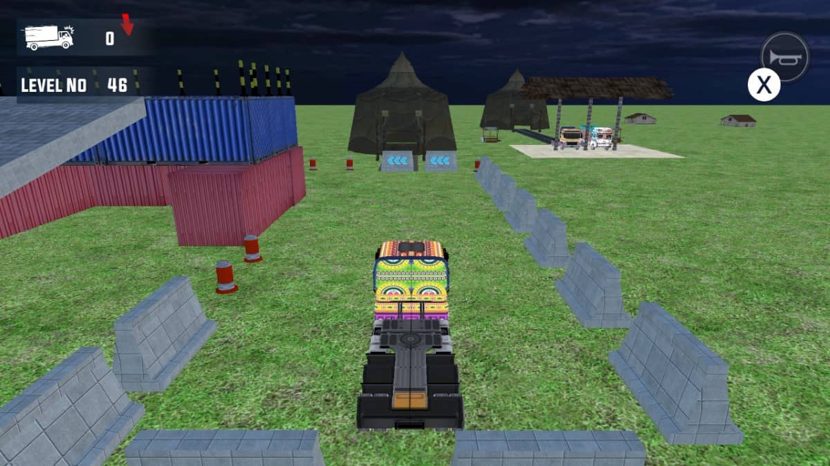 A nighttime in‑game view from Truck Driving showing how darkness transforms the track layout and atmosphere.