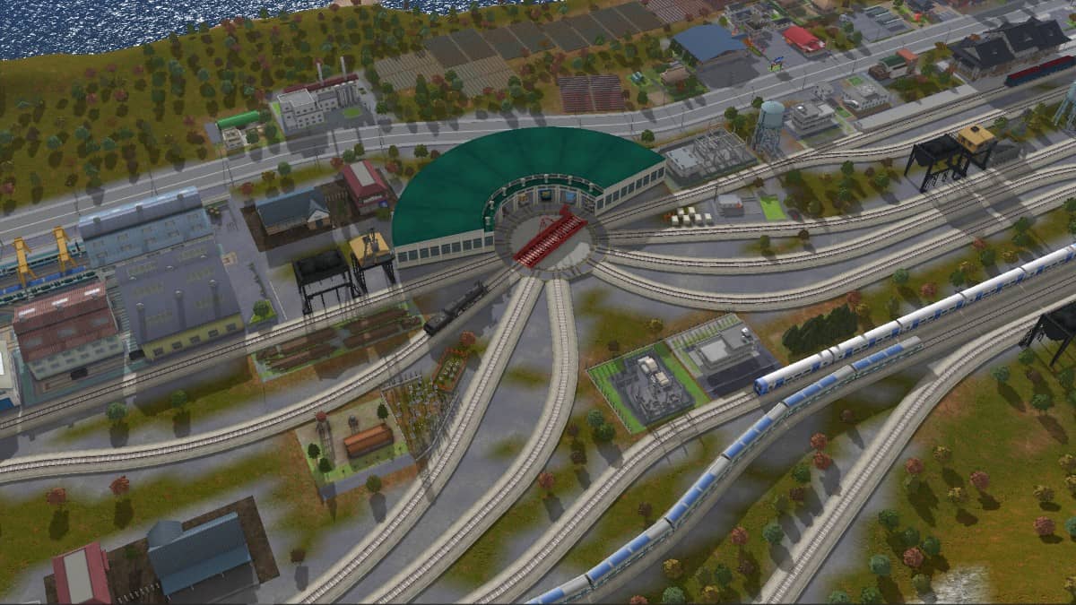 A rotating station layout in A-Train 9 V5.0: Japan Train Simulator Ultimate Edition viewed from above as it houses multiple trains.