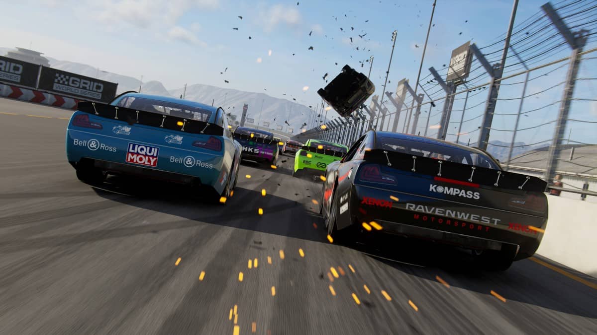 Two GRID Legends Deluxe Edition NASCAR cars race side by side with sparks flying as they approach a corner.