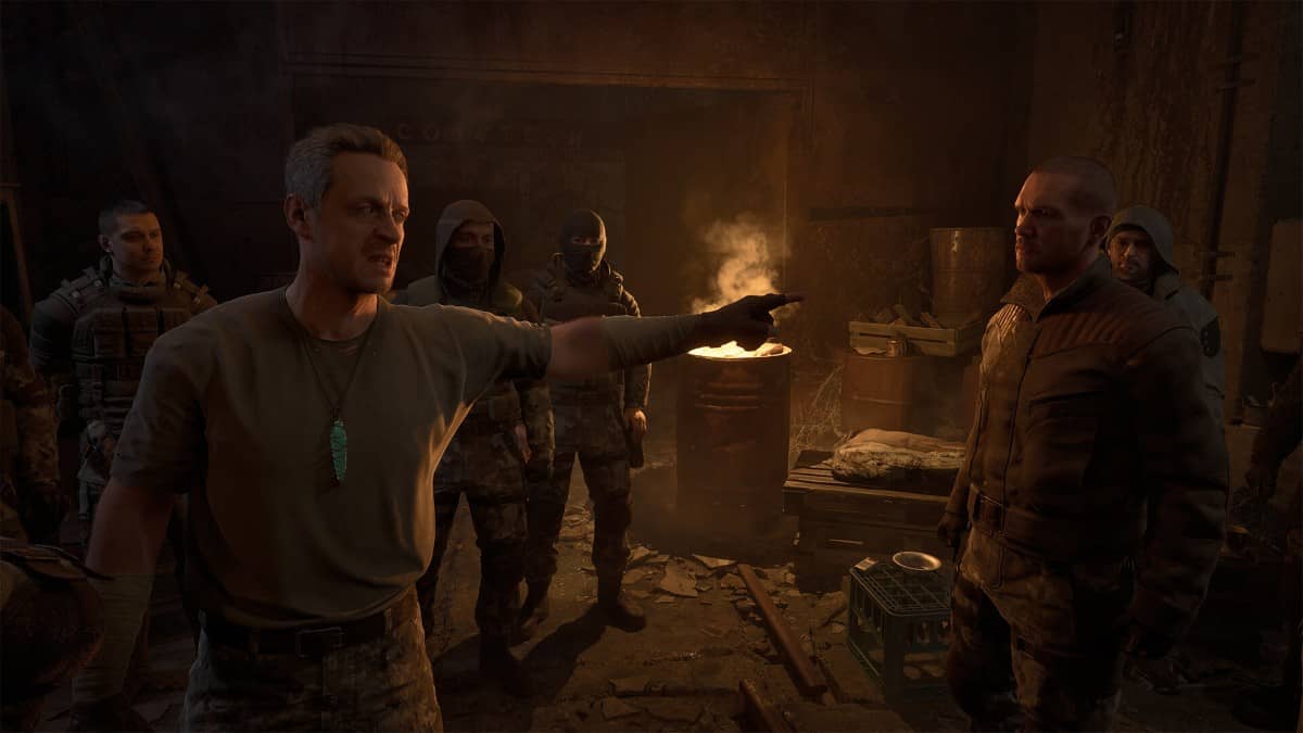 Survivors arguing around a barrel fire at night in S.T.A.L.K.E.R. 2: Heart of Chornobyl.