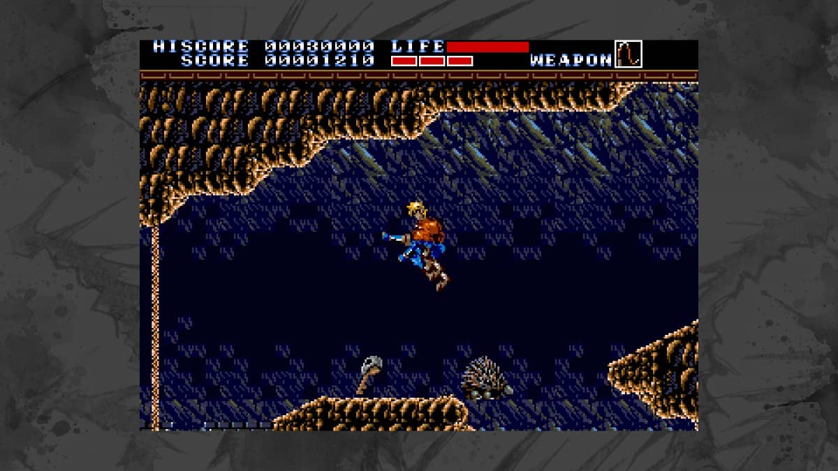 Evan leaps across crumbling platforms in a dark cave in Earnest Evans Collection.