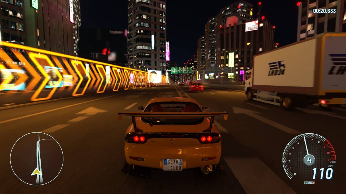 Gear.Club Unlimited 3 showing downtown Tokyo at night with detailed lights and buildings in a high-speed scene.