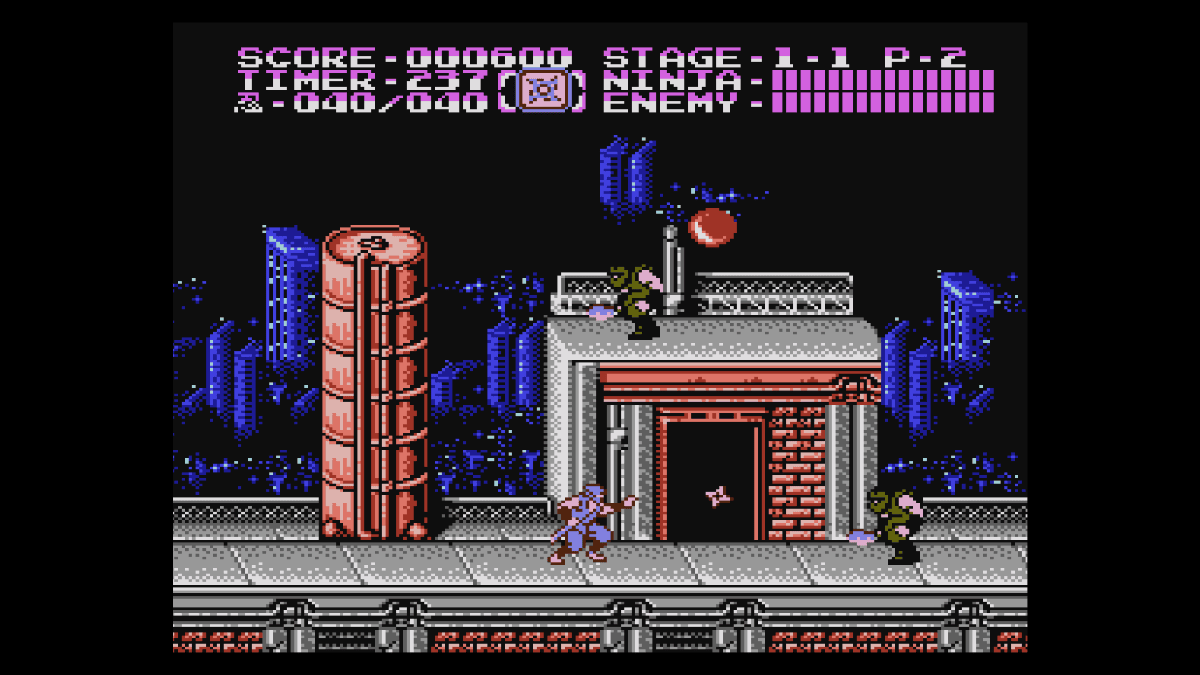 Ryu moves through the first street stage with enemies on upper platforms in Console Archives Ninja Gaiden II: The Dark Sword of Chaos.