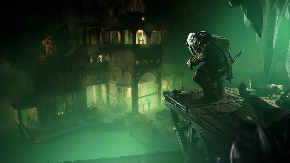 Styx overlooking a dark, dimly lit shanty town from a high perch in Styx: Blades of Greed during a stealthy survey.