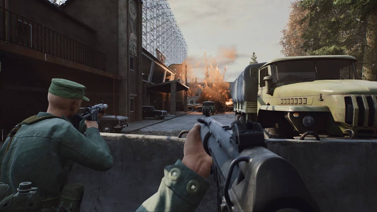 A tense '83 firefight in a town with large buildings and concrete roadblocks, shared by Gert Lush Gaming.
