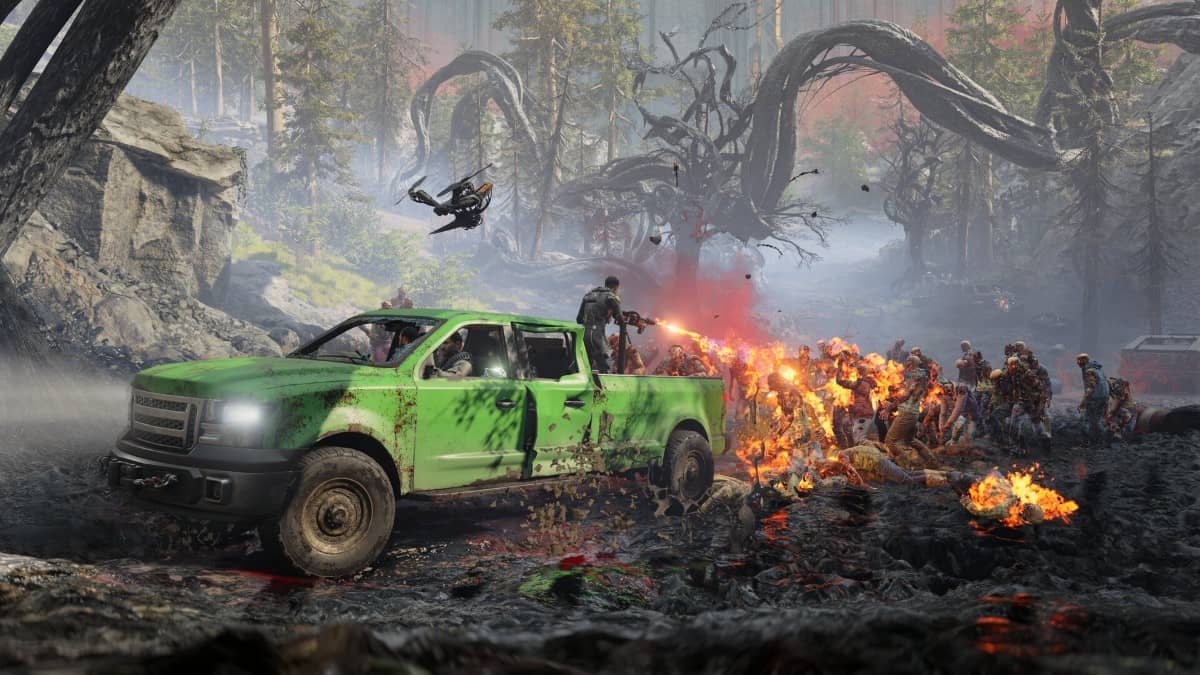 A team in John Carpenter's Toxic Commando uses a massive flamethrower to escape a wave, via Gert Lush Gaming.