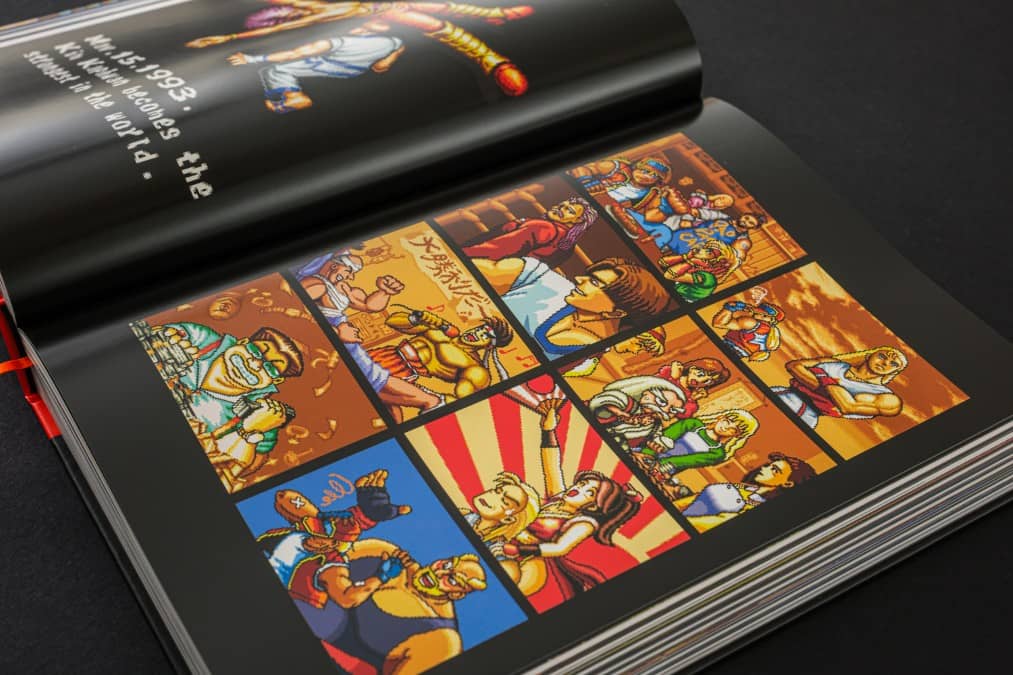 Gert Lush Gaming displays open pages showcasing the massive gallery of artwork inside The Ultimate History book.
