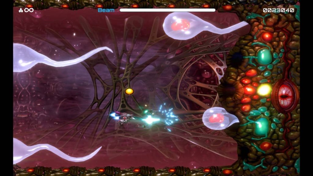 Gert Lush Gaming faces a massive boss filling the tight screen with waves of enemies in R-Type Dimensions III.
