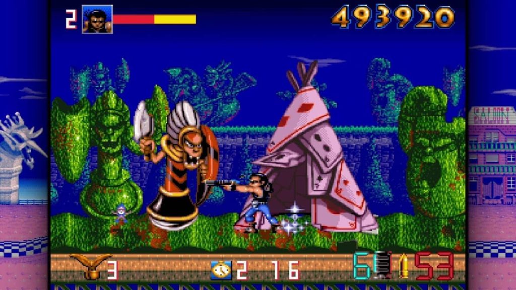 Gert Lush Gaming fights a huge enemy past a playing card tent.