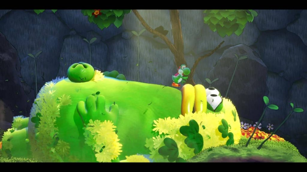 Gert Lush Gaming explores a cavern where Yoshi stands atop a massive resting character in Yoshi and the Mysterious Book.